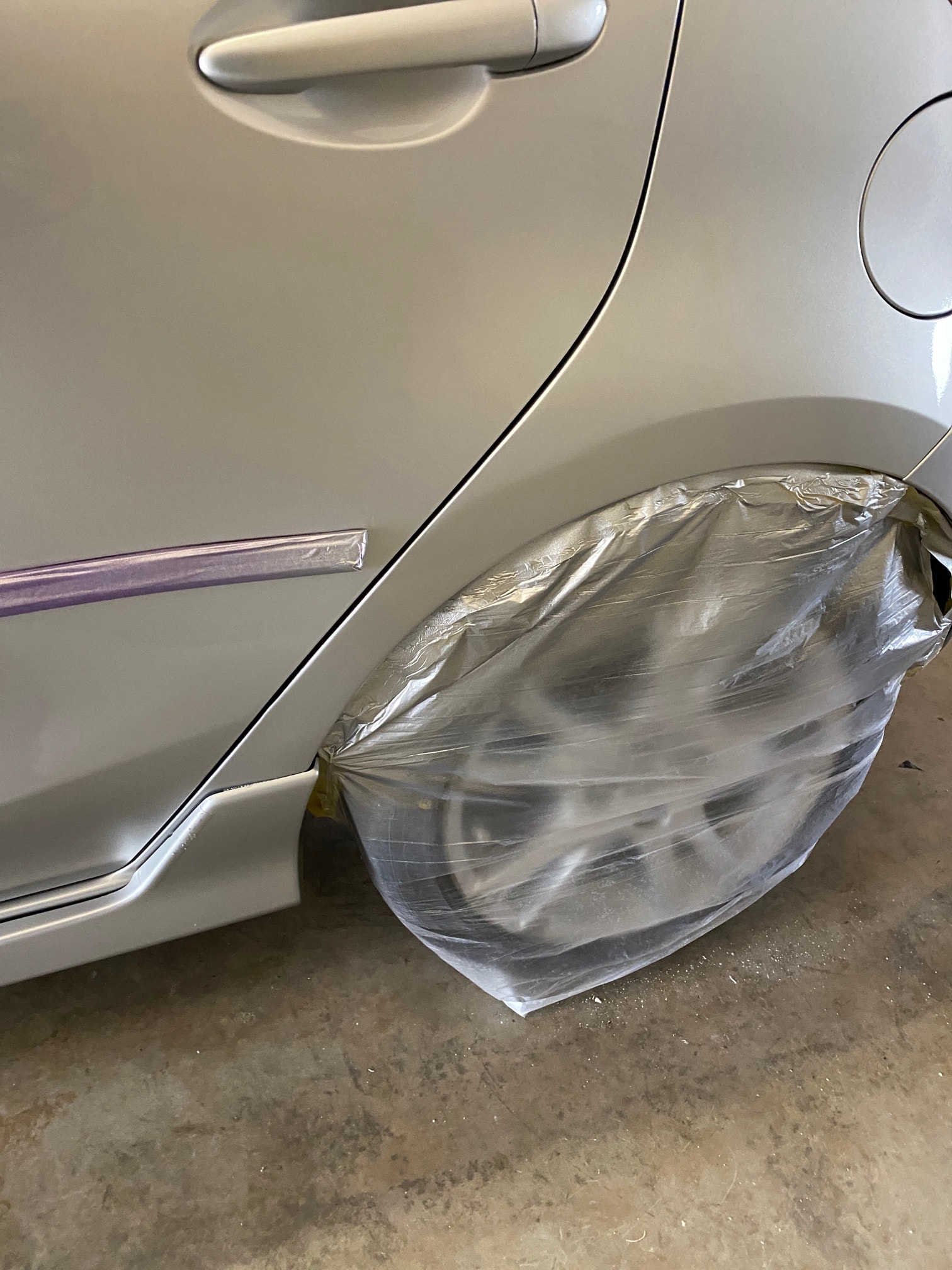 After — Quarter panel  dent & paint damage