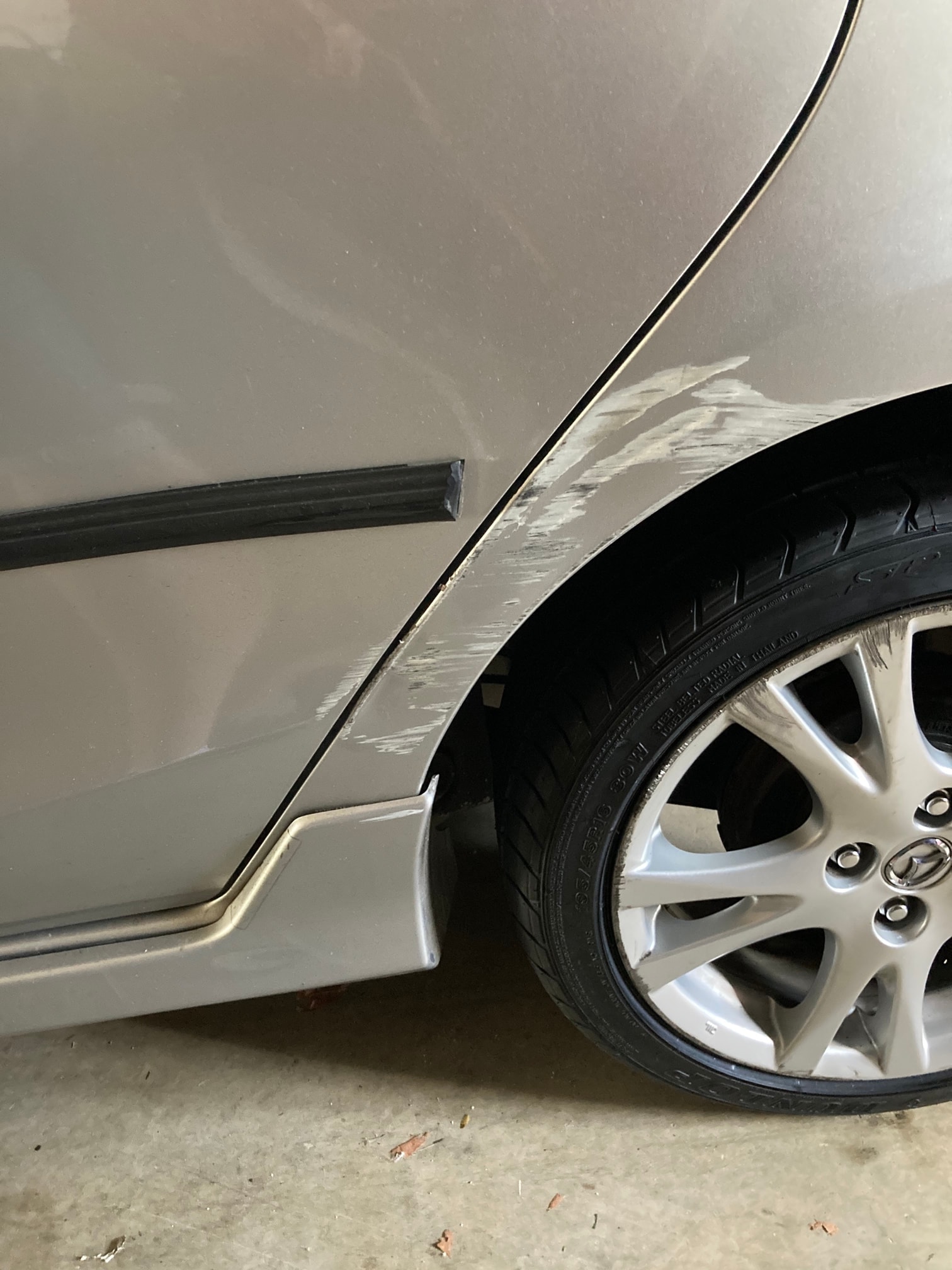 Before — Quarter panel  dent & paint damage