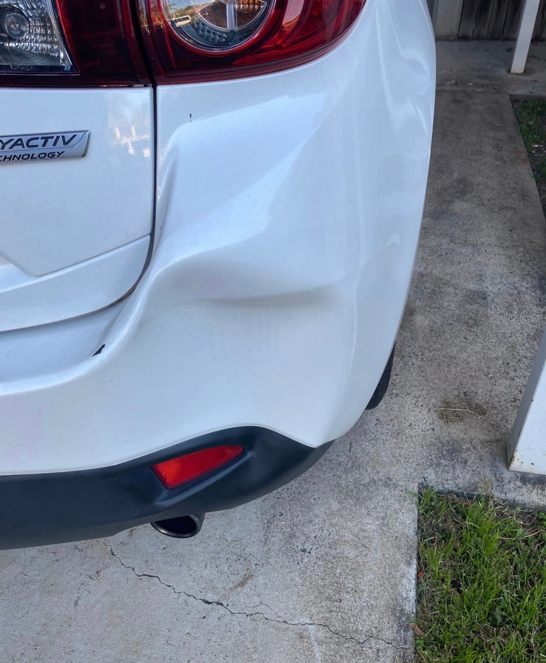 Before — Bumper dent